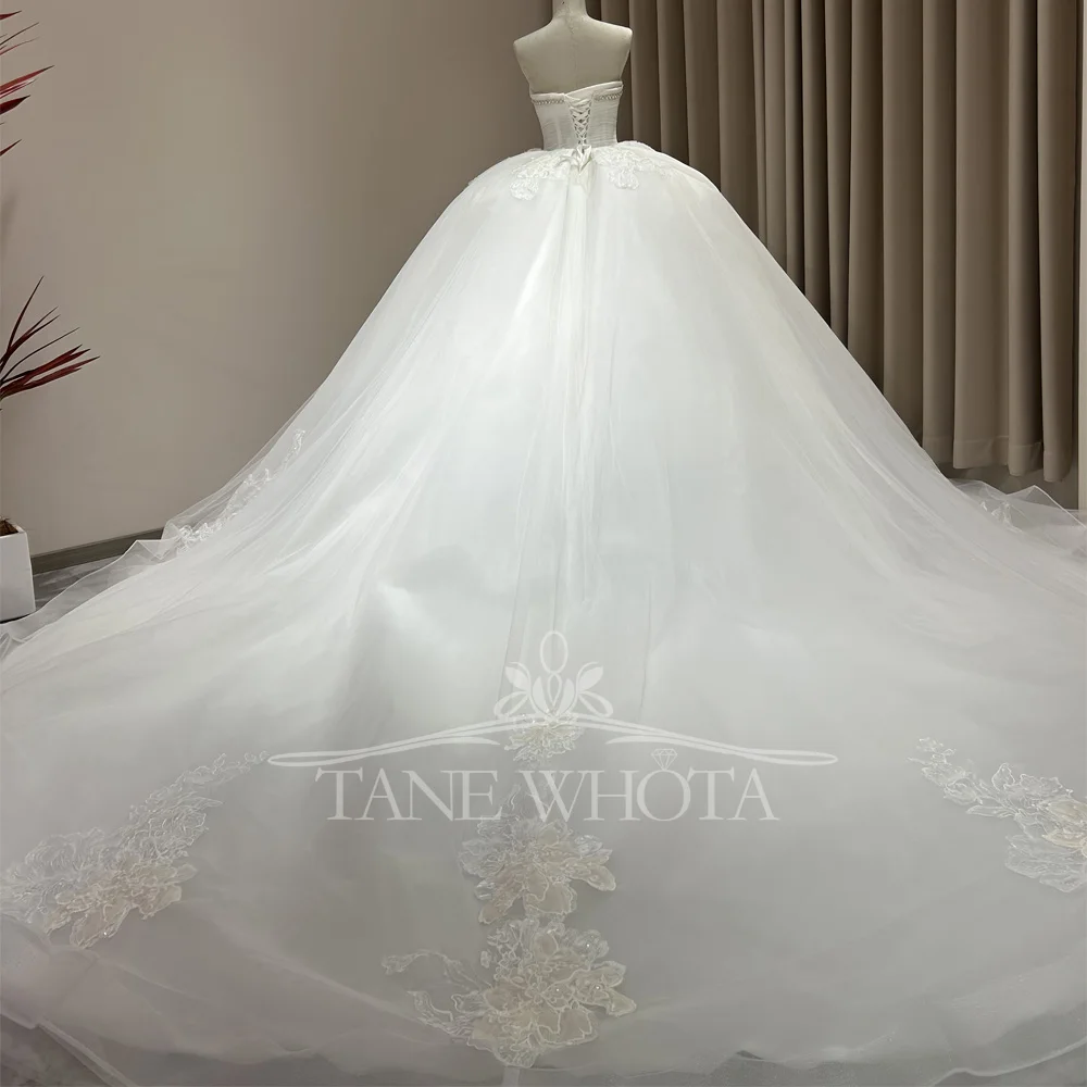 Suknia ślubna 2025 без бретелек без рукавов на шнуровке сзади бальное платье с вышивкой бисером свадебное платье по индивидуальному заказу роскошное