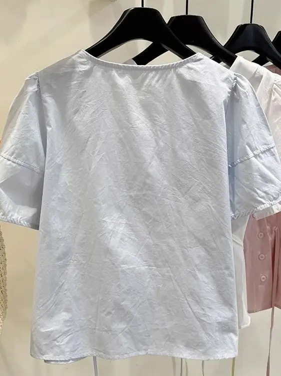 Afslankende kleur Asymmetrische knop V-Ne Summer irt Dames Faion Bubble Sve Top Koreaanse Sle Loose Fit ort S...