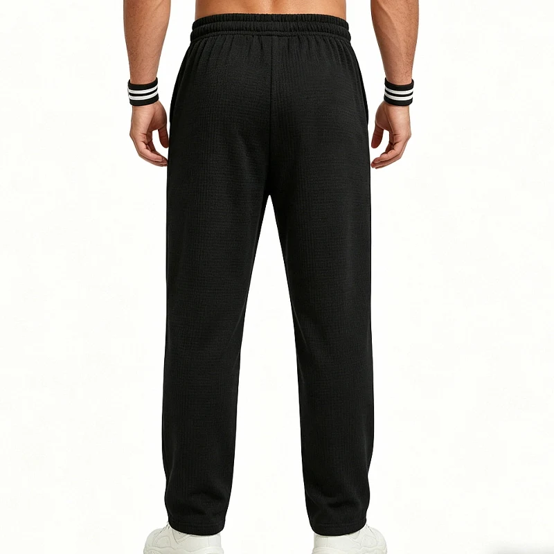 Herren-Jogginghose aus Waffelstrick mit geradem Bein, elastischem Bund und Seitentaschen – Detail 22