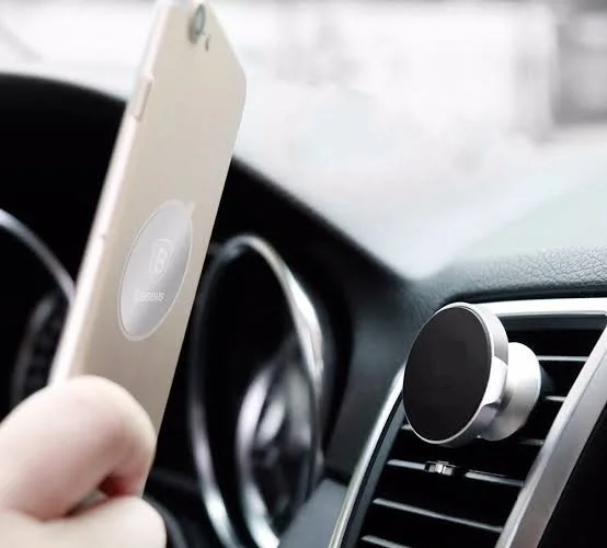 Magnetic Phone Holder That Plugs Into A Car's Air Conditioning System