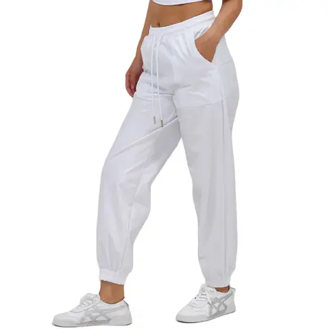 Plus-size Women's Streetwear Trousers, Adorned with Gold Foil Detailing, Radiate Dazzling Colours That Command Attention.