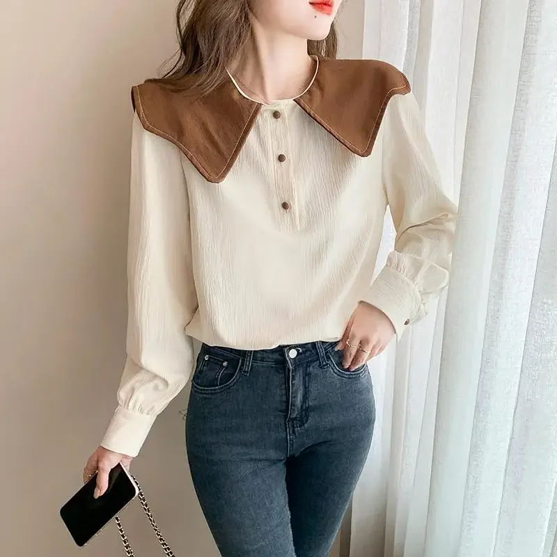 เสื้อเชิ้ตแขนยาวผู้หญิง แต่งระบาย กระดุมผ่าหน้า ชายเสื้อจีบ แขนทรงโคมไฟ สไตล์พรีปปี้ มินิมอล อ่อนหวาน สง่างาม ชุดฤดูใบไม้ผลิ