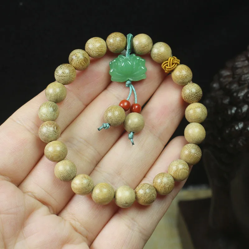 Papuan milky wood 8mm bracelet with green lotus design, unisex cultural accessory, handcrafted jewelry