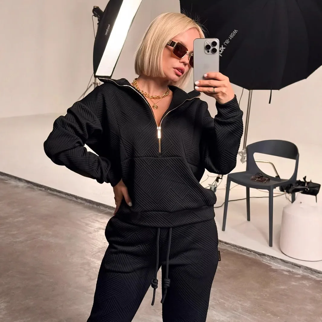 Abito casual da donna europeo e americano tinta unita a maniche lunghe con cerniera pantaloni larghi con lacci