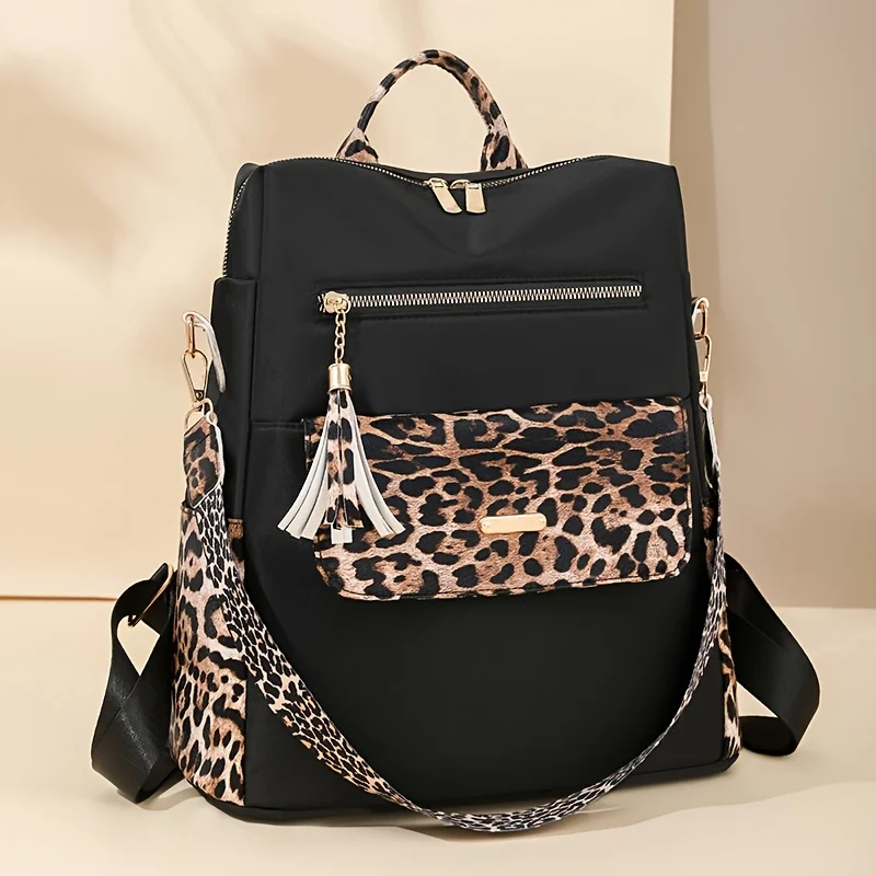 

New Women's Oxford Cloth Backpack Niche Design Leopard Print Tassel Bag Large Capacity Travel School Bag