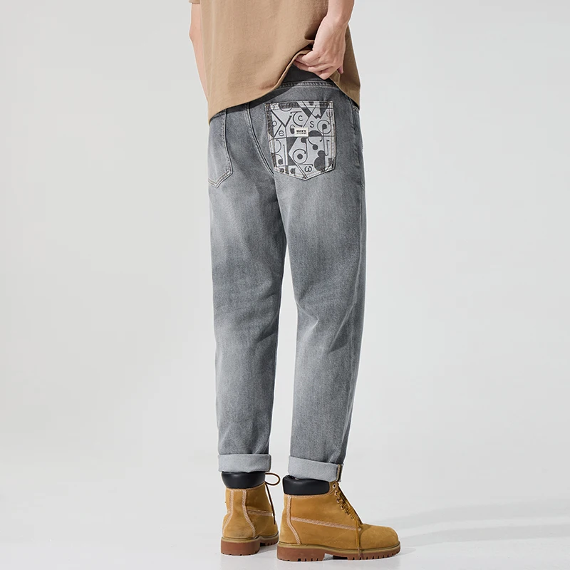 

16080 Spring and summer new tapered small leg jeans Harlan grey stretch printing comfortable and breathable men's trousers