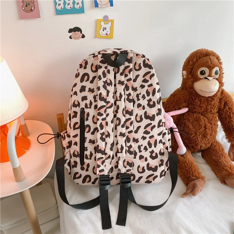 Bolsa de ordenador de viaje con estampado de leopardo para mujer, mochila impermeable de nailon de gran capacidad, mochilas escolares para chicas universitarias