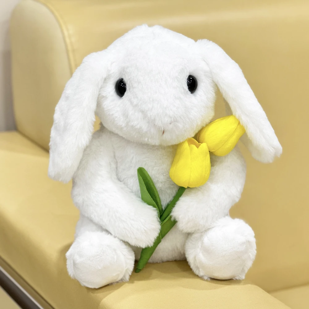 Peluche di coniglio bianco con fiori di tulipano