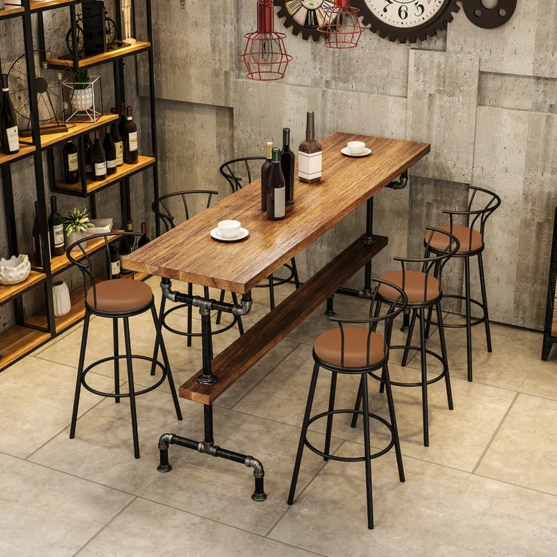 Industrial style retro water pipes, iron art solid wood bar tables and chairs, milk tea shop bars, high legged tables and chairs