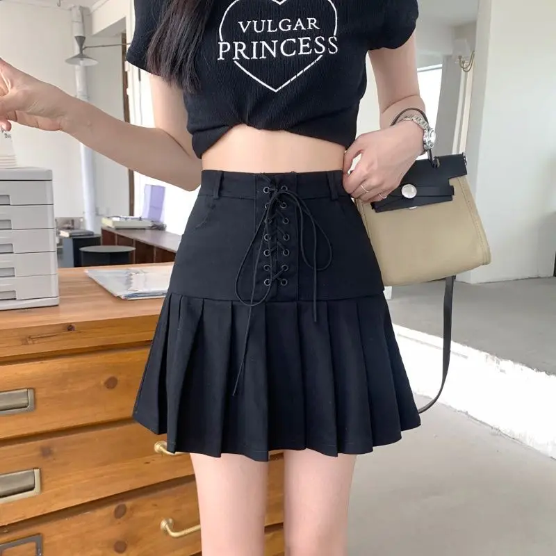 Fashion Solid Color Bandage Pleated Skirts Female Clothing 2025 Summer New Loose Preppy Style Zipper High Waist Mini Skirts
