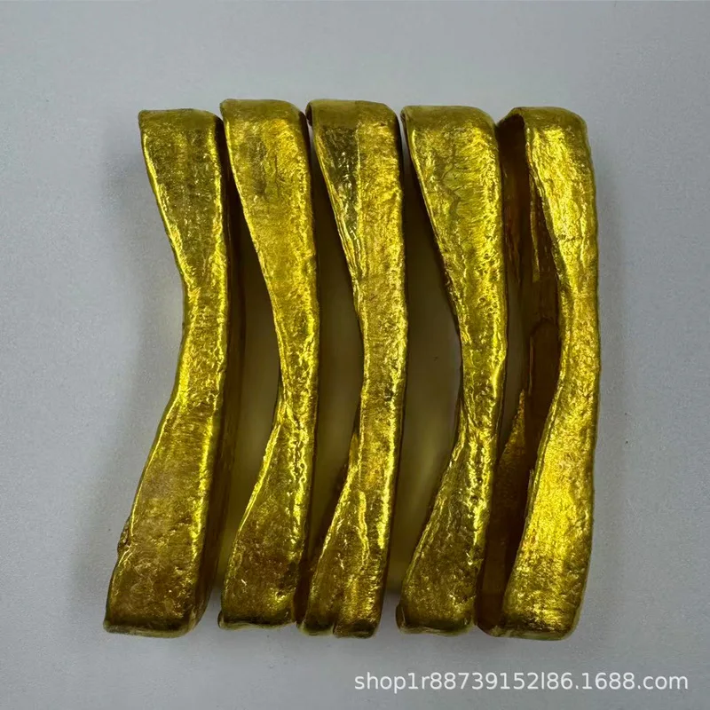 Handcrafted ingot, a decorative item of brass with gold plating, symbolizing the Five Emperors, and not made of actual