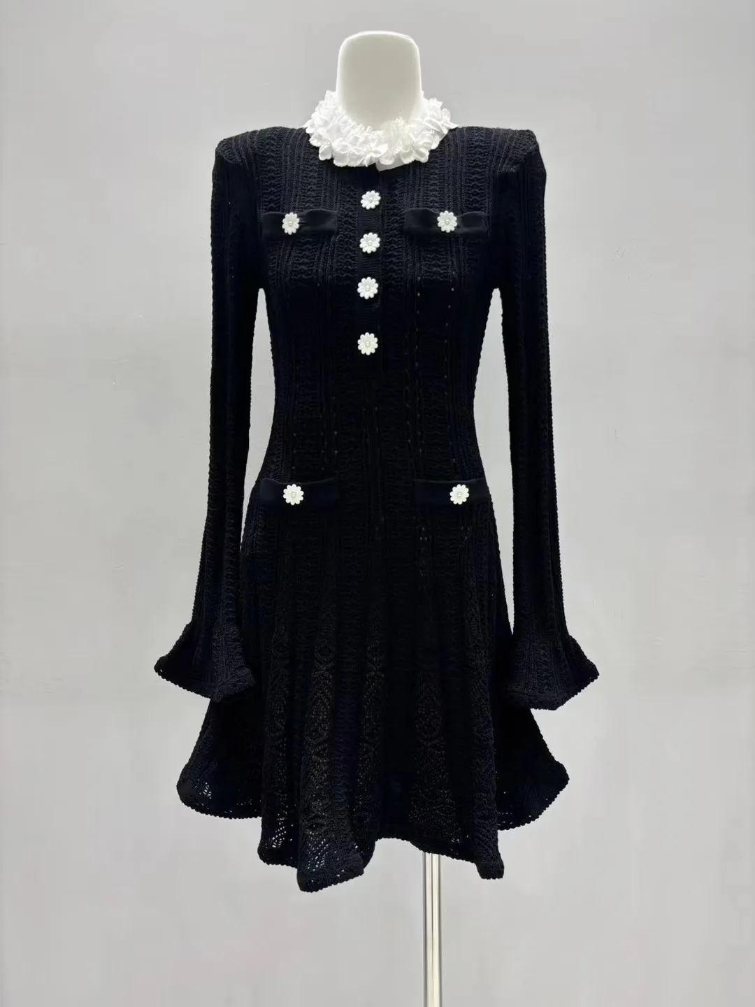 2026 winter new classic black flower decoration long-sleeved knitted dress, temperament fashion stretch slim women's dress