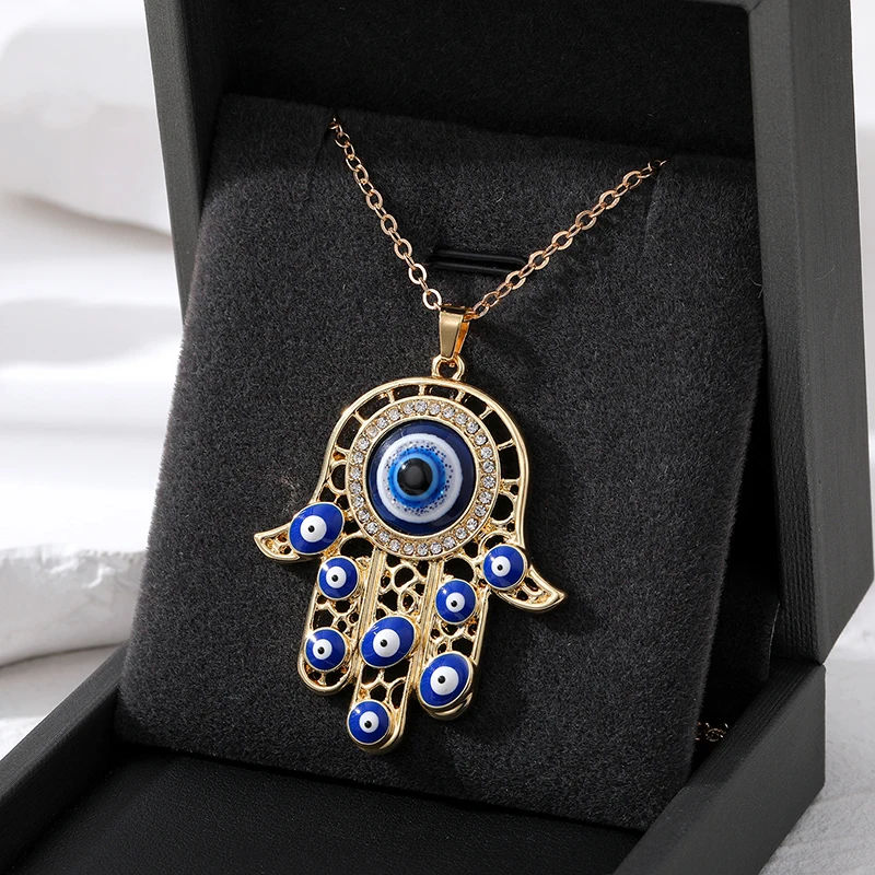 Enamel Retro Turkey Eye Hamsa Hand Necklace Women Men New Hollow Ethnic Zircon Blue Evil Eye Fatima Hand Sweater Chians Jewelry