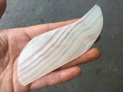 

gua sha Silk-wrapped white jade scraping board natural jade massage face-lifting jade board handle traditional chinese medicine