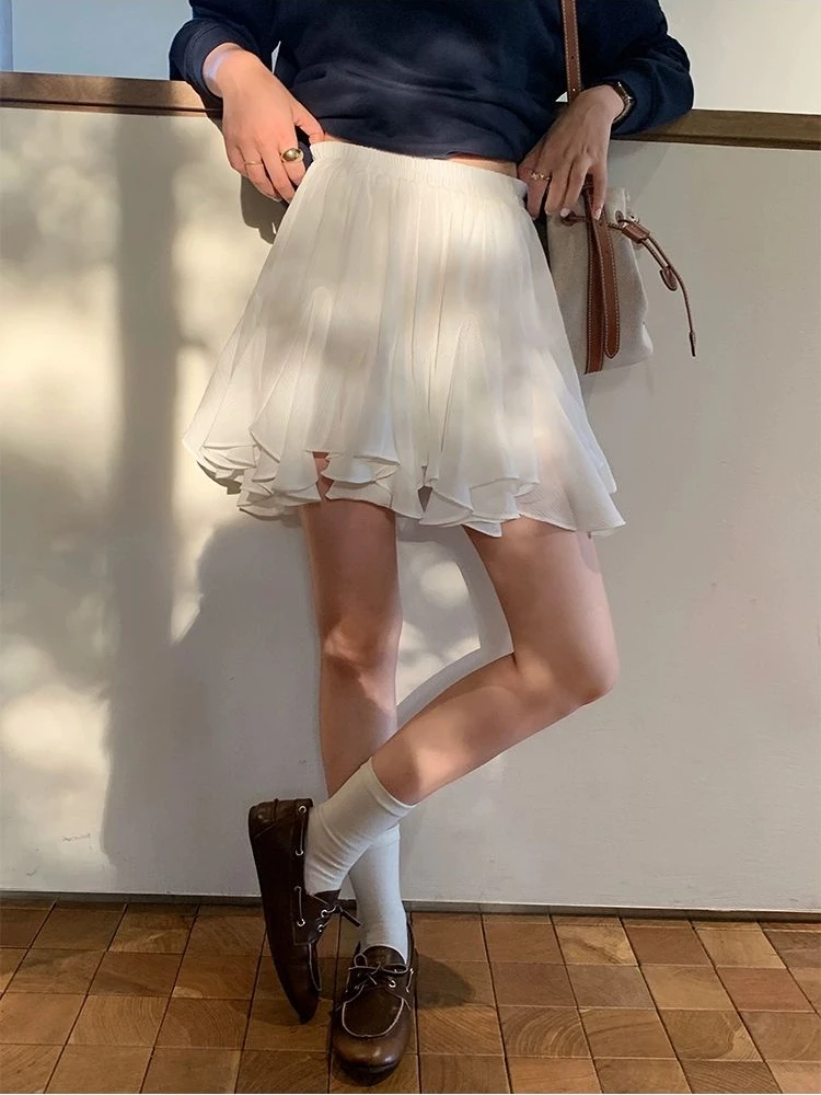 Francês branco irregular plissado mini saia 2025 verão elástico de cintura alta fofo a linha saias sólidas versátil faldas
