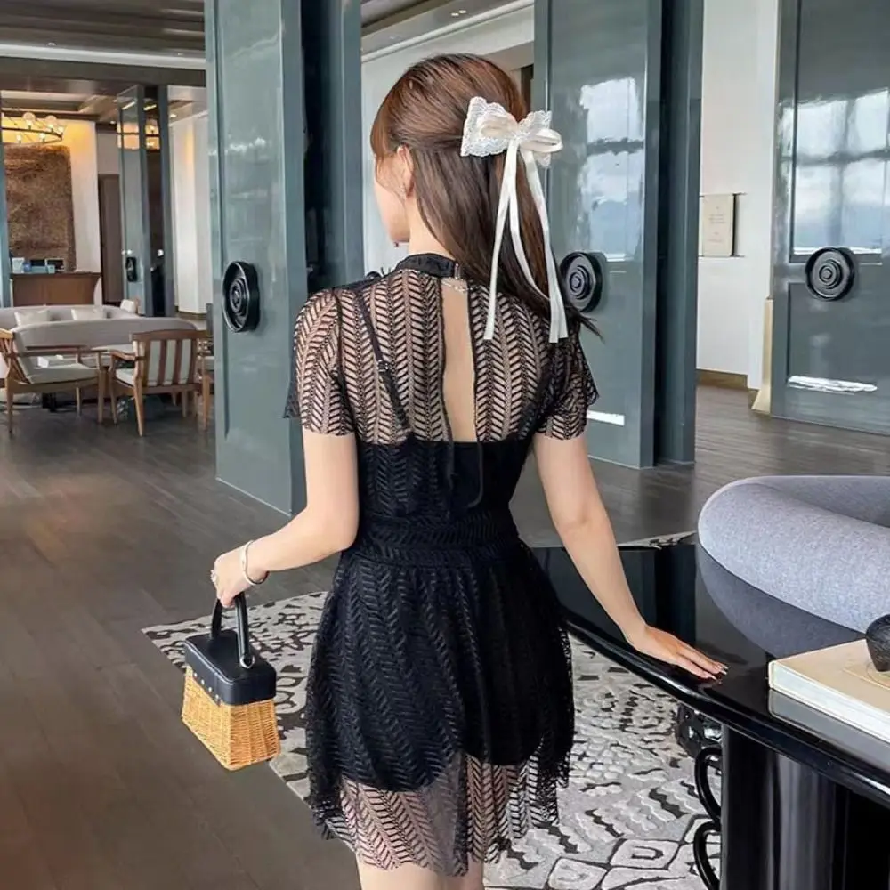 ชุดว่ายน้ำกระโปรงลูกไม้โปร่งตาข่าย แขนสั้น ชุดว่ายน้ำซีทรู ชุดชายหาด ชุดว่ายน้ำเปิดหลัง พร้อมฟองน้ำเสริมทรง สำหรับวันหยุดพักผ่อน