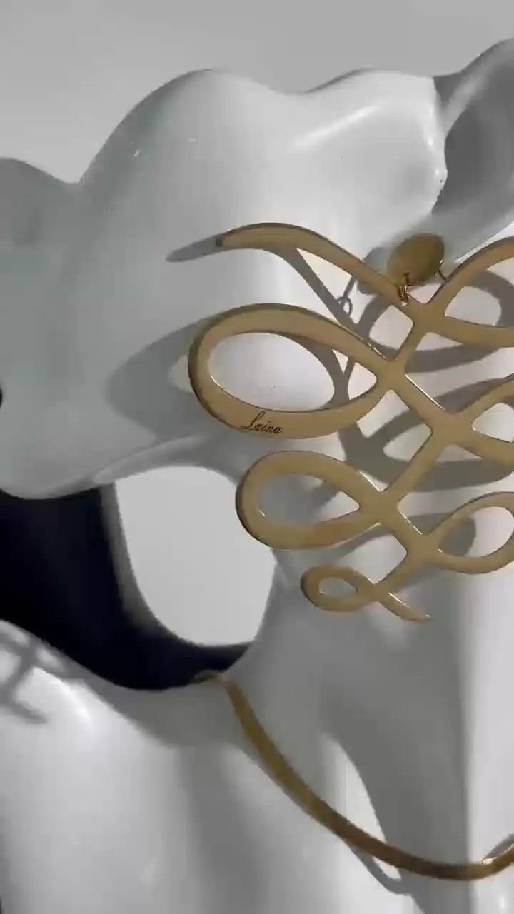 Video preview thumbnail for Large Squiggle Dangle Earrings