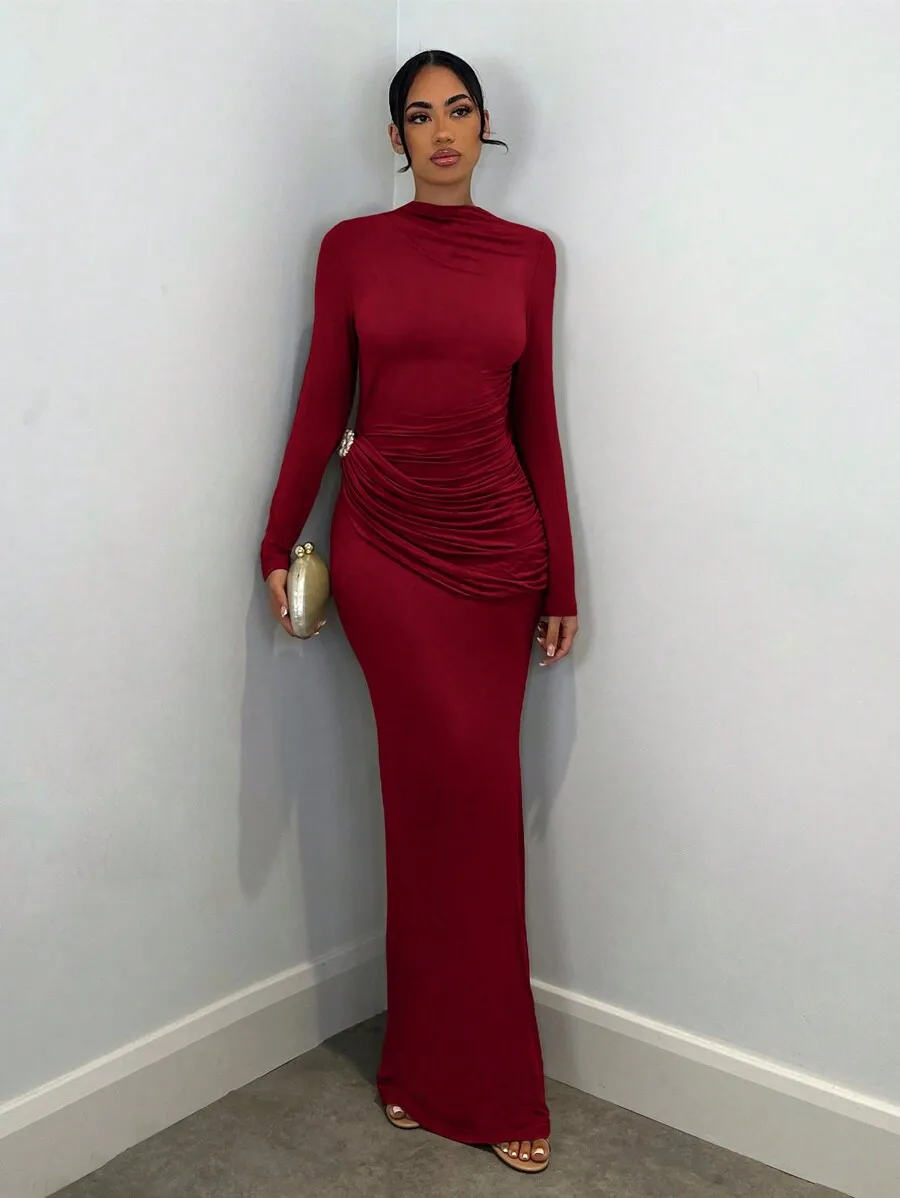 

Elegant Red Long Sleeve Maxi Dress with Ruched Detail and Metallic Accent