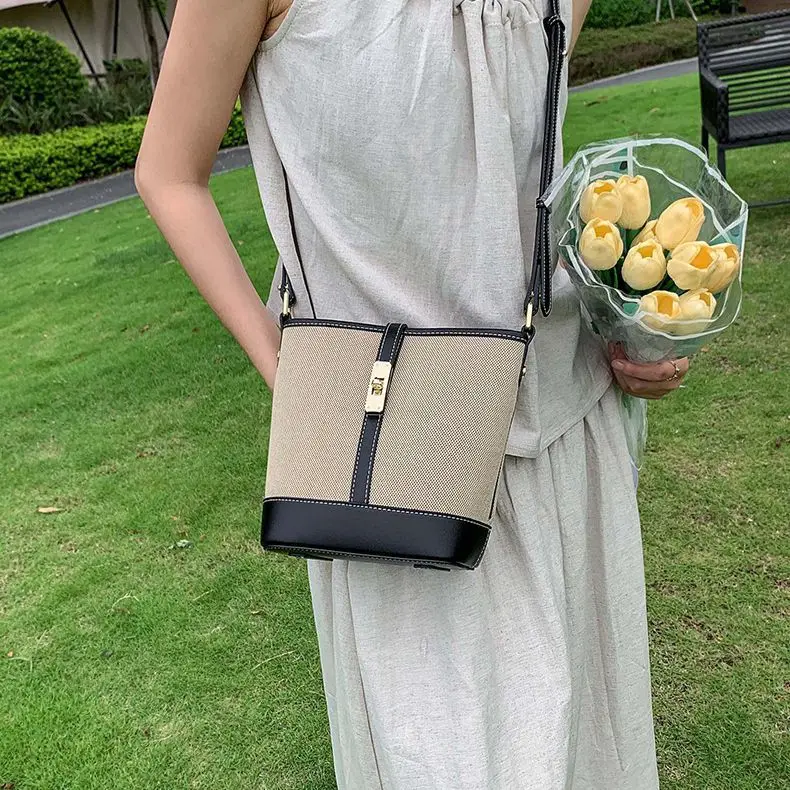 

Cowhide canvas splicing bucket bag single shoulder oblique span bag casual versatile