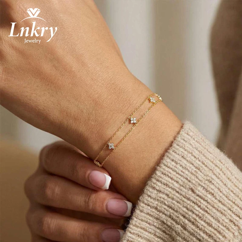

Браслет Lnkry из 14-каратного золота с четырехлистным цветком и двойной цепочкой для женщин, сертифицированный браслет с круглым муассанитом 2 мм, украшение для рук, подарок