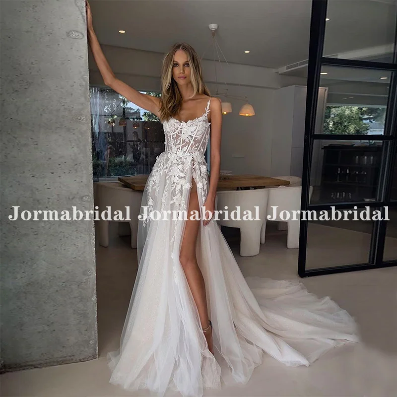 Sexy High Slit Beach Bridal Gown with Expose Boning 2023 Spaghetti Straps Lace Appliques Mori Tulle Wedding Dresses Sweep Train