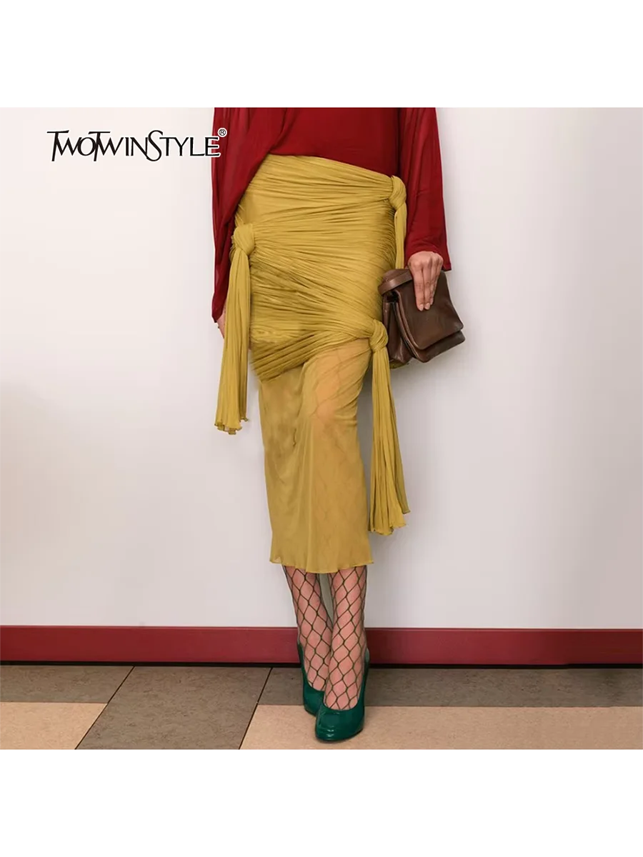 

TWOTWINSTYLE Solid Slimming Spliced Folds Fashion Skirts for Women High Waist Sheer Patchwork Knots Design Sense Skirt Female
