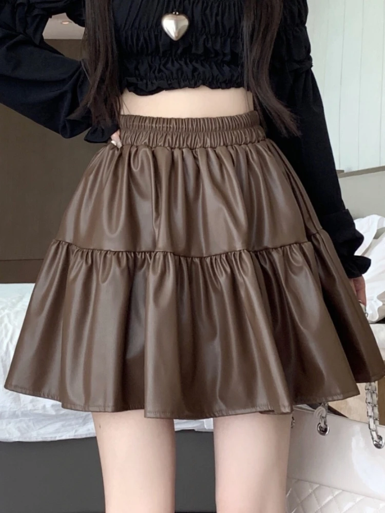 

Coffee PU Leather Short Skirt For Women In Autumn And Winter, Elastic Waist Splicing, Fluffy Umbrella Coffee A-Line Cake Skirt,