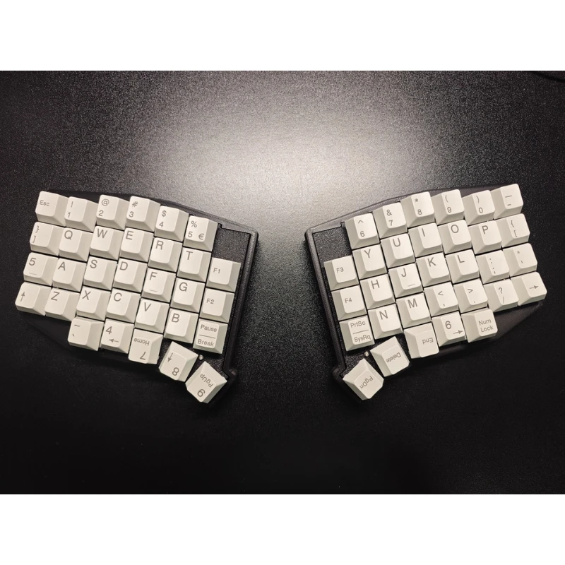 

WSOFLE Wireless Split Keyboard 2.4G 64 Keys Ergonomic Hotswappable 60% Layout 3D PLA Vial All Key Programmable Mini Keyboard Kit