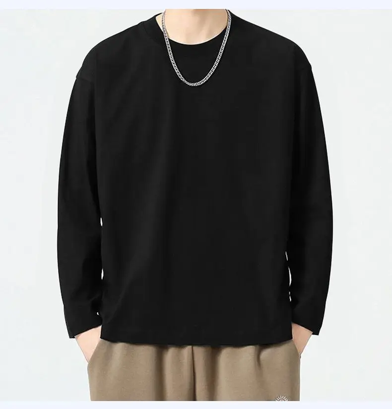 Camiseta de manga larga para hombre, otoño e invierno, color liso, corte ajustado, versátil, cuello redondo informal.