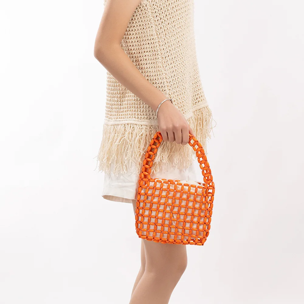 

Цветные допаминовые деревянные ретро минималистичные сумки из бисера для отдыха на море, женская сумка ручной работы с полым дизайном, новая универсальная сумка