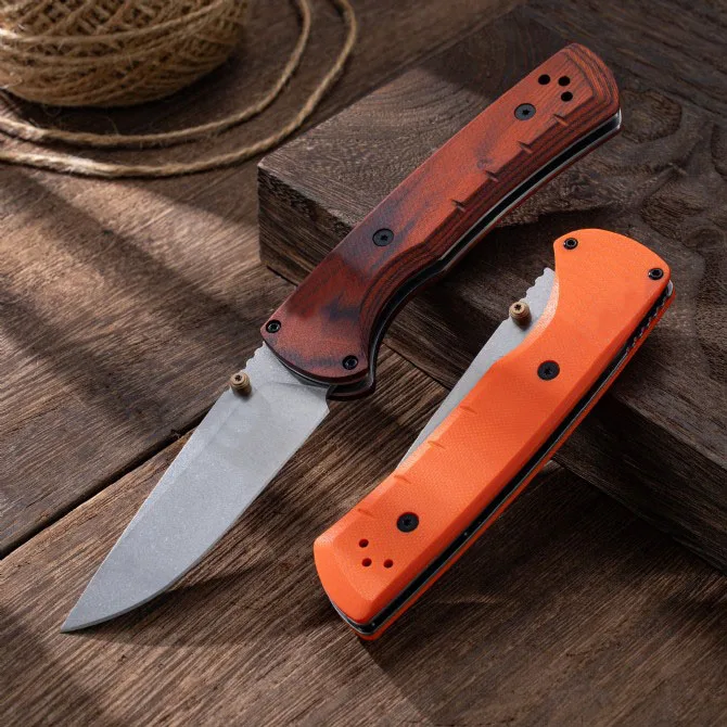 Liei Store 15090 Hunt Bugout Folding 3.46 Magnacut Clip Point Blade, G10/Dymondwood Handles