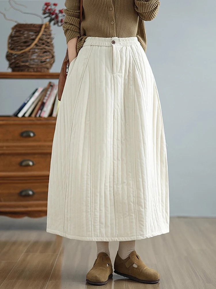 

Minimalist Solid Quilted Women Midi Skirts 2025 New Autumn Winter Elastic Waist Thick Warm Cotton-padded A-Line Umbrella Skirts