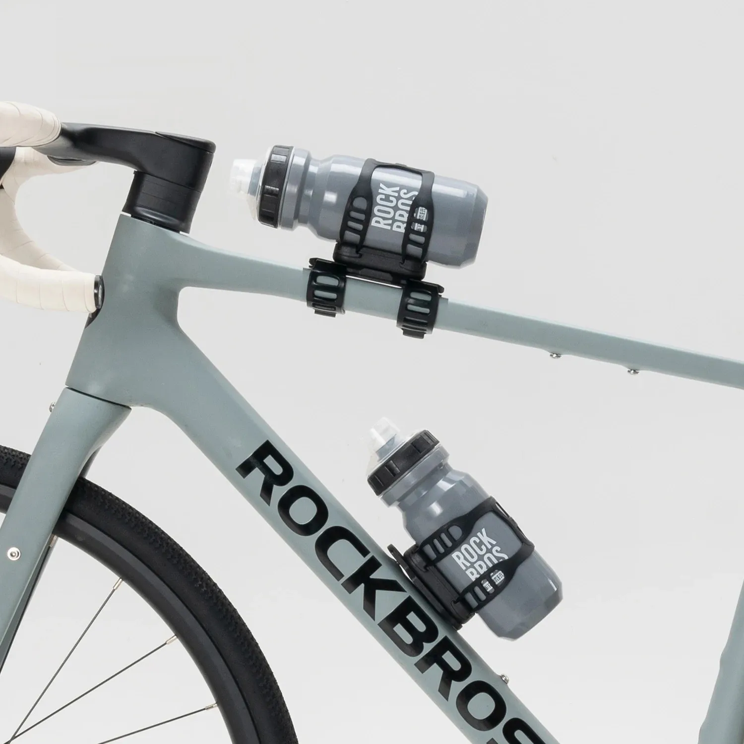 ROCKBROS Strap-mounted Bike Water Bottle Holder Magnetic Quick Release Bicycle Frame Kettle Cage Scratchproof Bottle Bracket