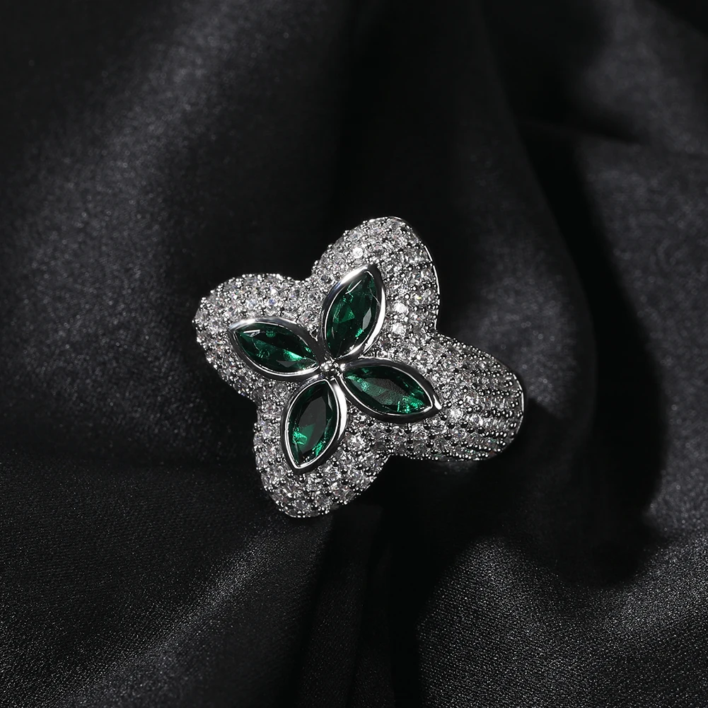 THE BLING KING Clover Flower Rings Micro Paved Out Green Cubic Zirconia Punk Ring Hiphop Jewelry For Men Women Party Gift