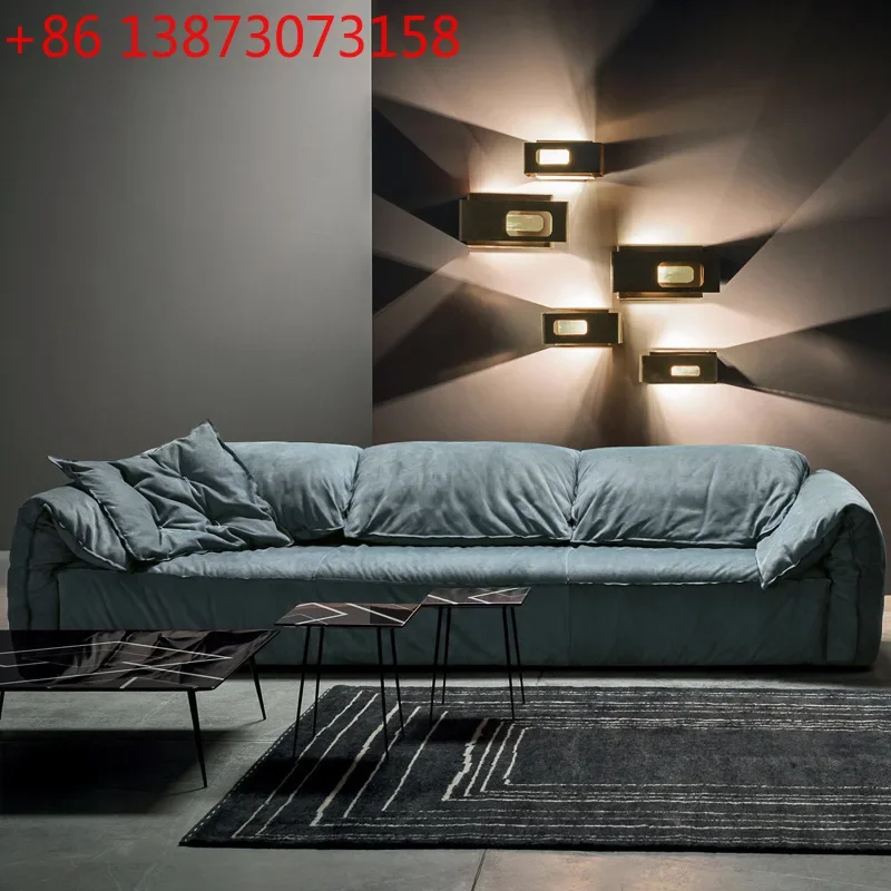 

Итальянский минималистичный матовый диван из технологичной ткани, кремового цвета, с наполнителем из слонового пуха, для гостиной, для небольшой квартиры, комбинированный тканевый диван.