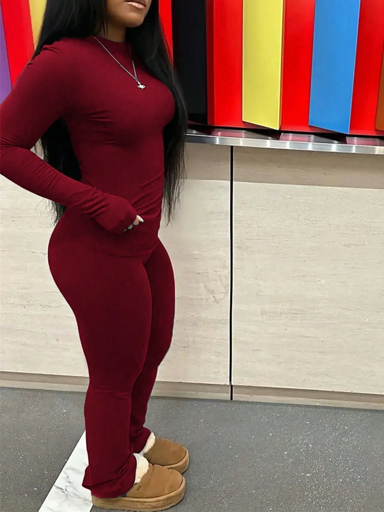 

Women Solid Color Round Neck Long Sleeve Fitted Top And Flare Leggings Set