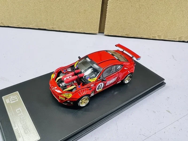 

DCM 1:64 4586 limited edition red Diecast Car Model