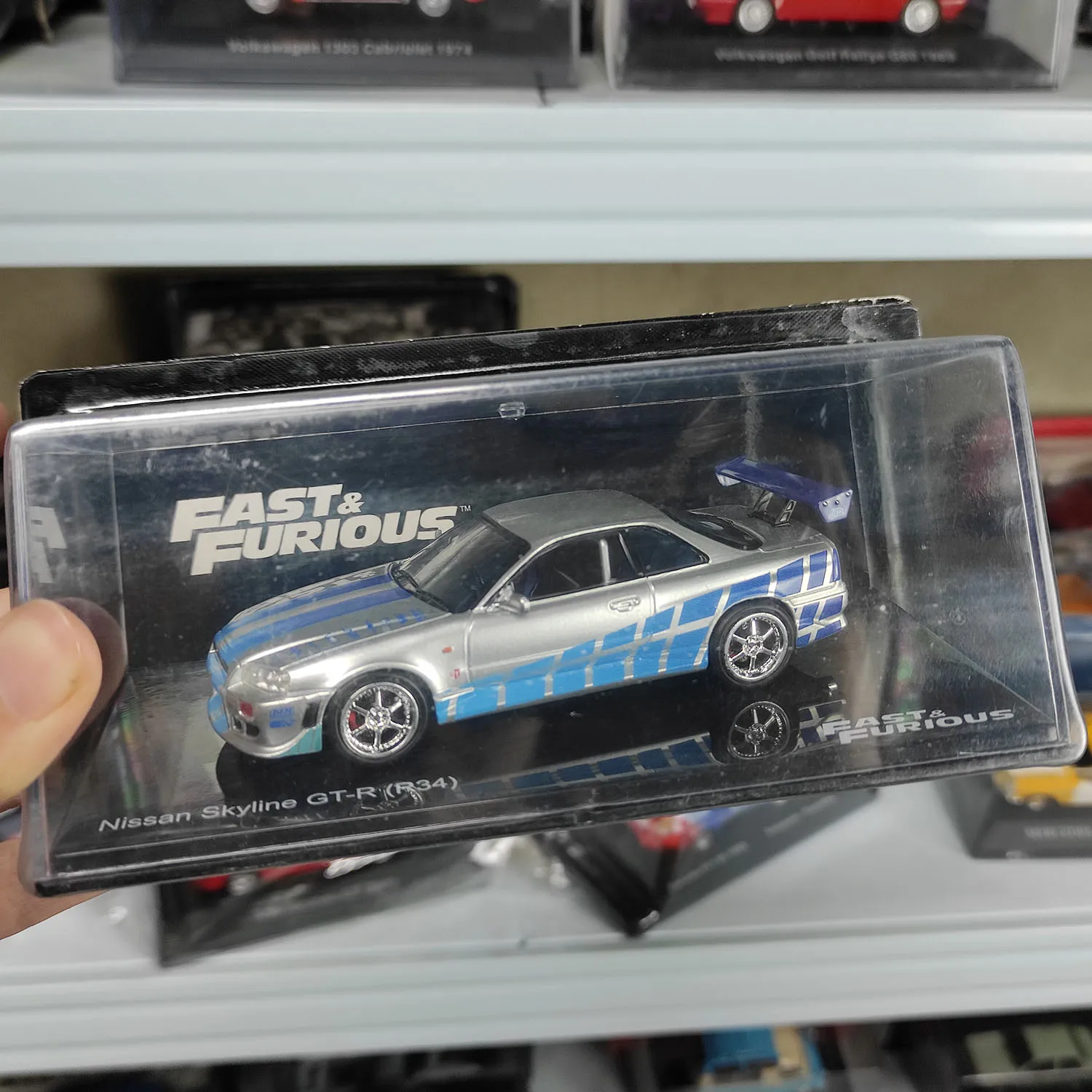 Литая под давлением модель автомобиля из сплава Skyline GT-R R34 в масштабе 1:43 Литая под давлением модель автомобиля из сплава Skyline GT-R R34 в масштабе 1:43