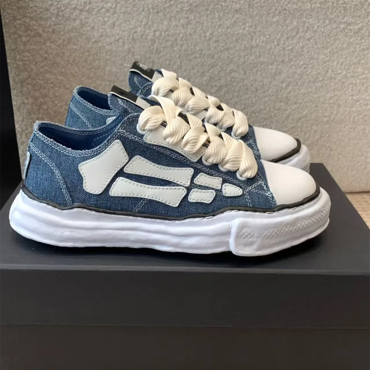 أحذية العظام للرجال والنساء سميكة القاع الارتفاع زيادة موضة الاتجاه منخفضة أعلى قذيفة رئيس شخصية مذابة قماش غير رسمي #1