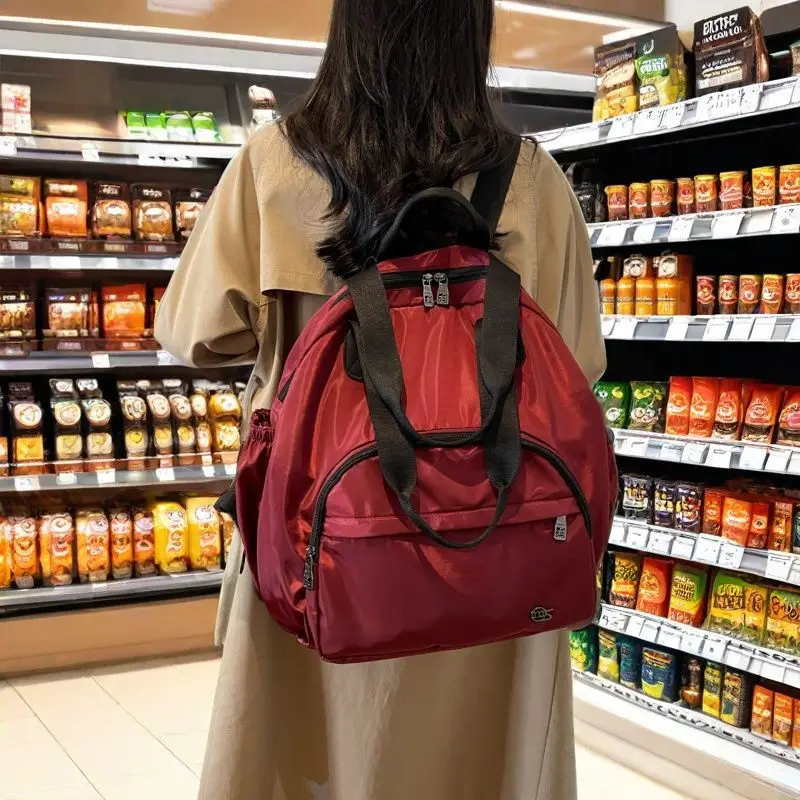 

Водонепроницаемый рюкзак, модная женская многофункциональная сумка через плечо, дизайнерская дорожная мягкая сумка из ткани с большой вместимостью.