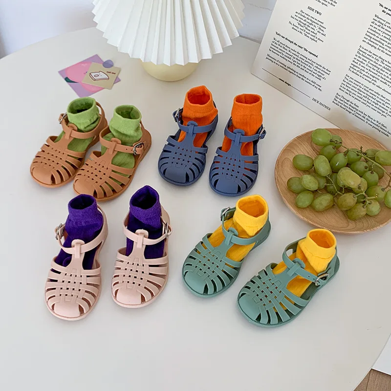 Sandali da ragazzo vuoti traspiranti per bambini sandali estivi Casual da spiaggia romani in PVC per bambini scarpe semplici in tinta unita