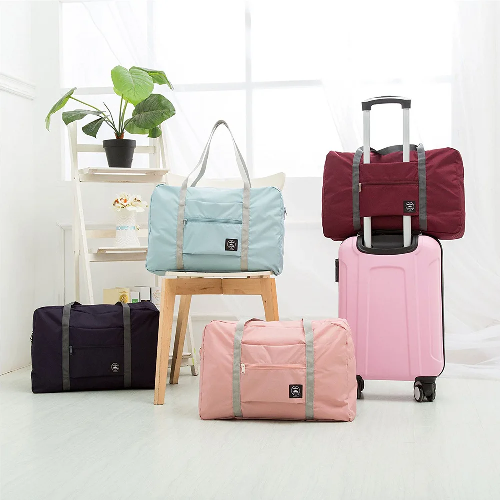 Tas Travel Lipat Nilon Laris Uniseks Tas Kapasitas Besar Koper Wanita Tas Tangan Tahan Air Tas Travel Pria Tas Penyimpanan Pakaian