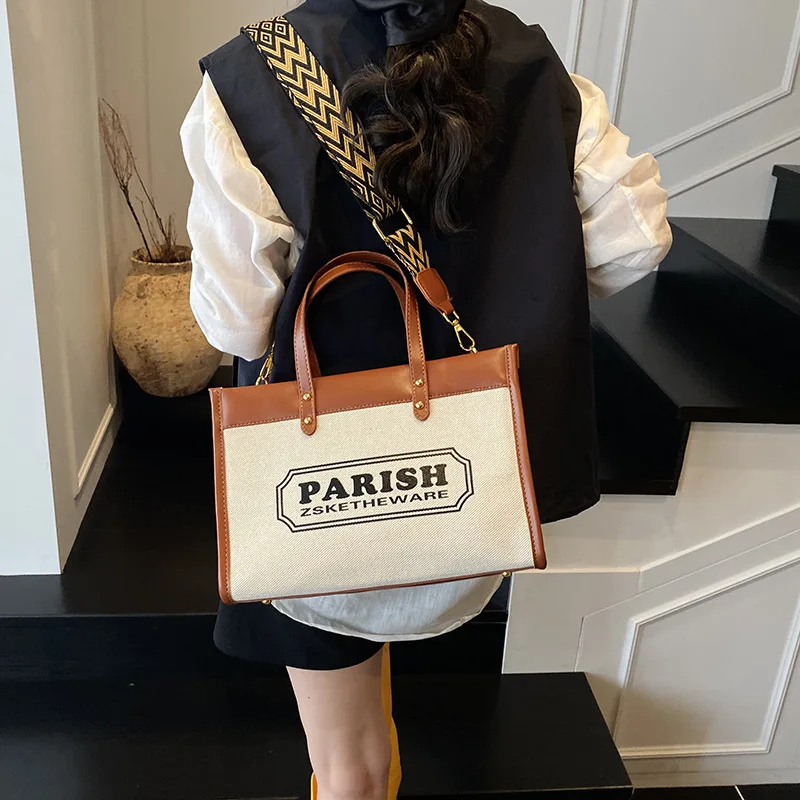 

2025 new retro contrasting letters large capacity portable tote bag women's commuter texture messenger bag