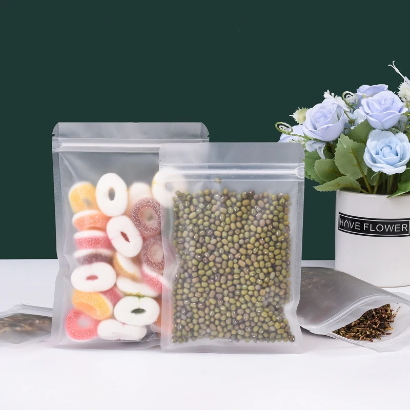 Płaska półprzezroczysty matowy plastikowy pojemnik do przevhowywania torba na zamek przekąska z orzechami żywnościowymi o zapachu płatków śniadaniowych zgrzewanie na prezent
