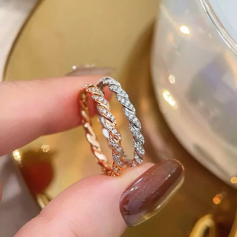 A delicate and compact single-row diamond 925 sterling silver ring. A simple jewelry for ladies.