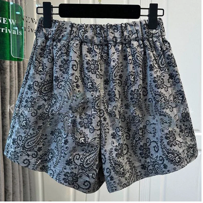 새로운 올 매치 캐주얼 프린팅 인기 여성 의류 여름 패션 그레이 플로럴 와이드 레그 반바지 분위기