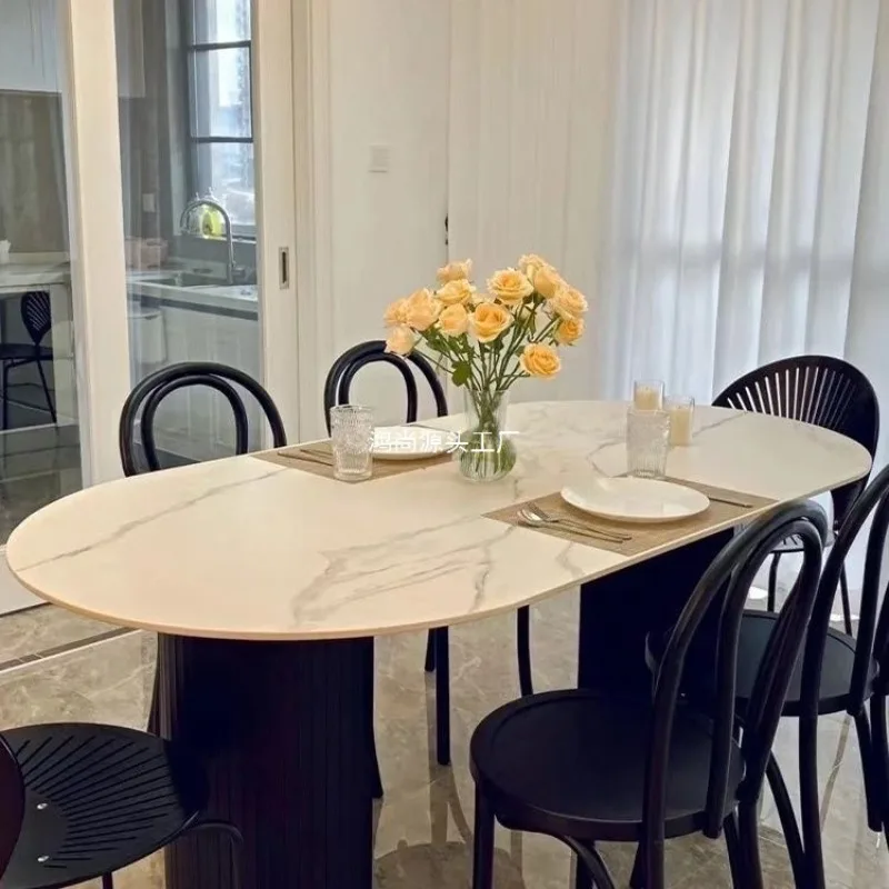 Modern simple black oval dining table household small apartment
