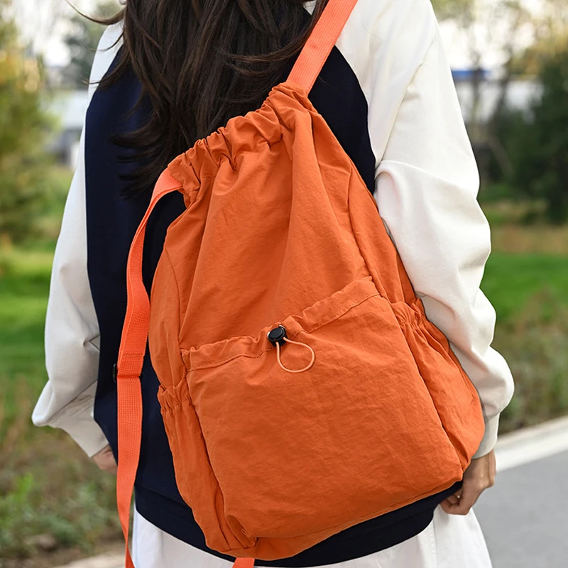 Mochila unisex, mochila escolar, tendencia para exteriores, ligera, de gran capacidad, impermeable, con cordón, bolsa de