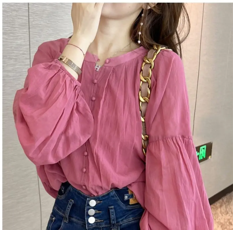 Spring and Summer New Simplicity Solid Color Trend Splicing Buttons Fashion Commuting Versatile Round Neck Long Sleeved Shirt