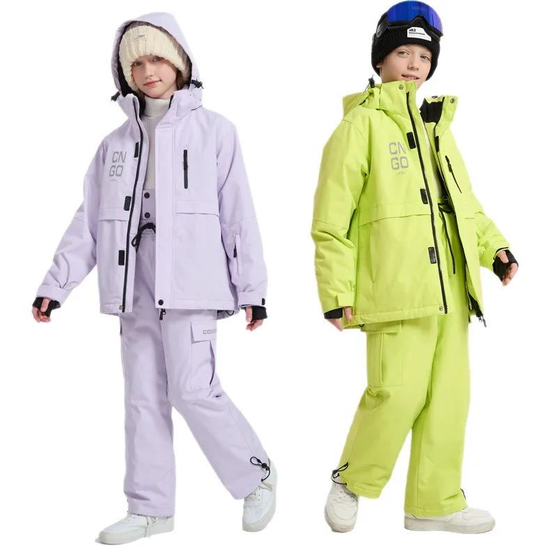 

Комплект детского лыжного костюма, водонепроницаемые и теплые однобортные, плотный хлопок, детские лыжные костюмы и брюки среднего и большого размера.